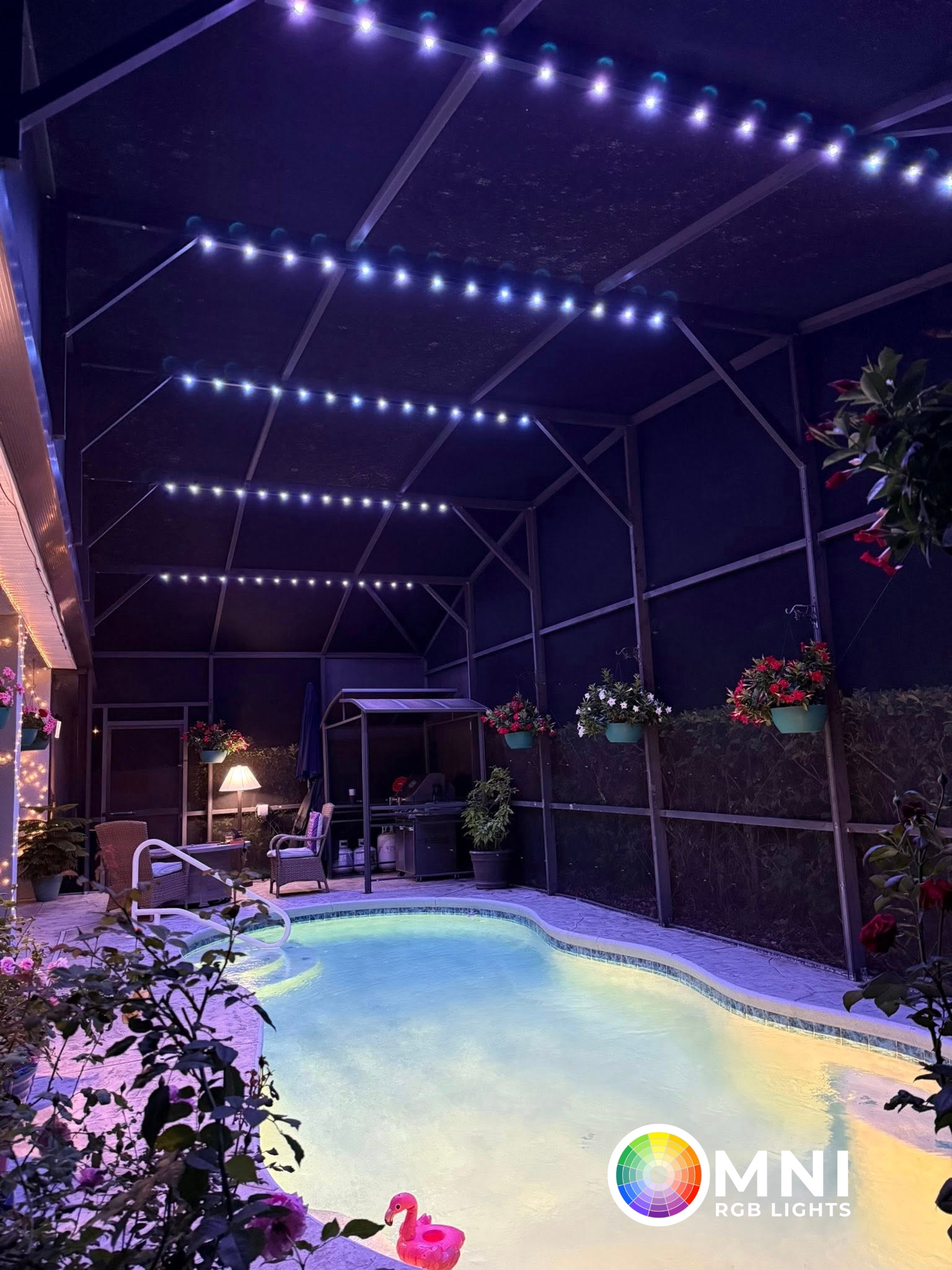 White and blue permanent lighting on a screened pool cage