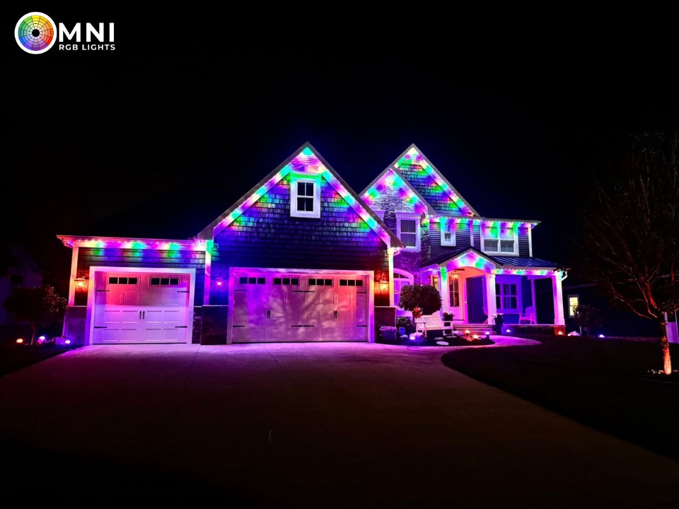 Purple and rainbow lighting on gables and garage doors