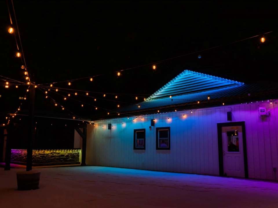 Patio string lights and RGB roofline lighting at a Melbourne Florida home